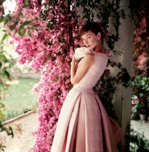 Audrey Hepburn photographed wearing Givenchy by Norman Parkinson, 1955 © Norman Parkinson Ltd/Courtesy Norman Parkinson Archive Audrey